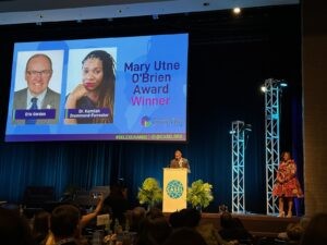 Black SEL leaders on stage at an awards ceremony, celebrating achievements in social emotional learning.