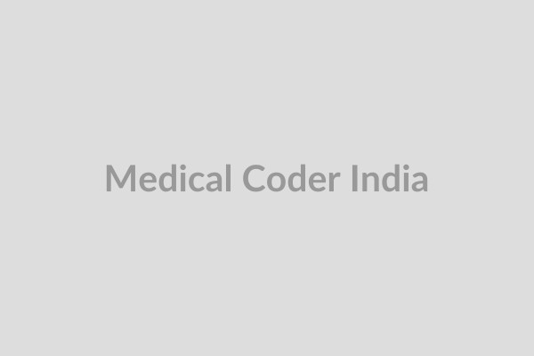 Medical Coder working on computer, focused on data entry and analysis for accurate healthcare billing in India