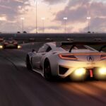 A high-speed race scene in Project Cars 2, showcasing detailed car models and dynamic track environment